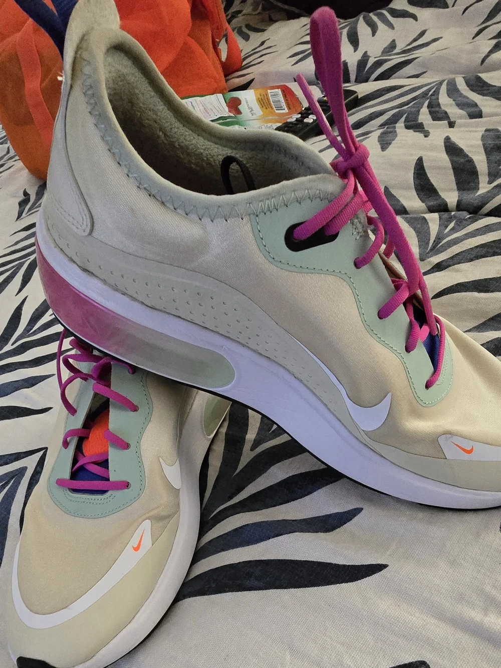 Nike Women’s White Sneakers with Pink Accents